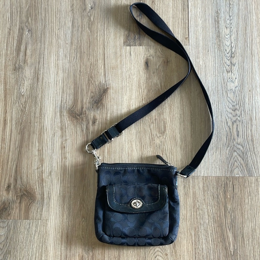 Coach black and silver crosssbody adjustable purse with front pocket